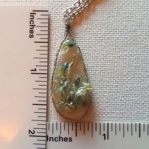 Floral necklace, amulet